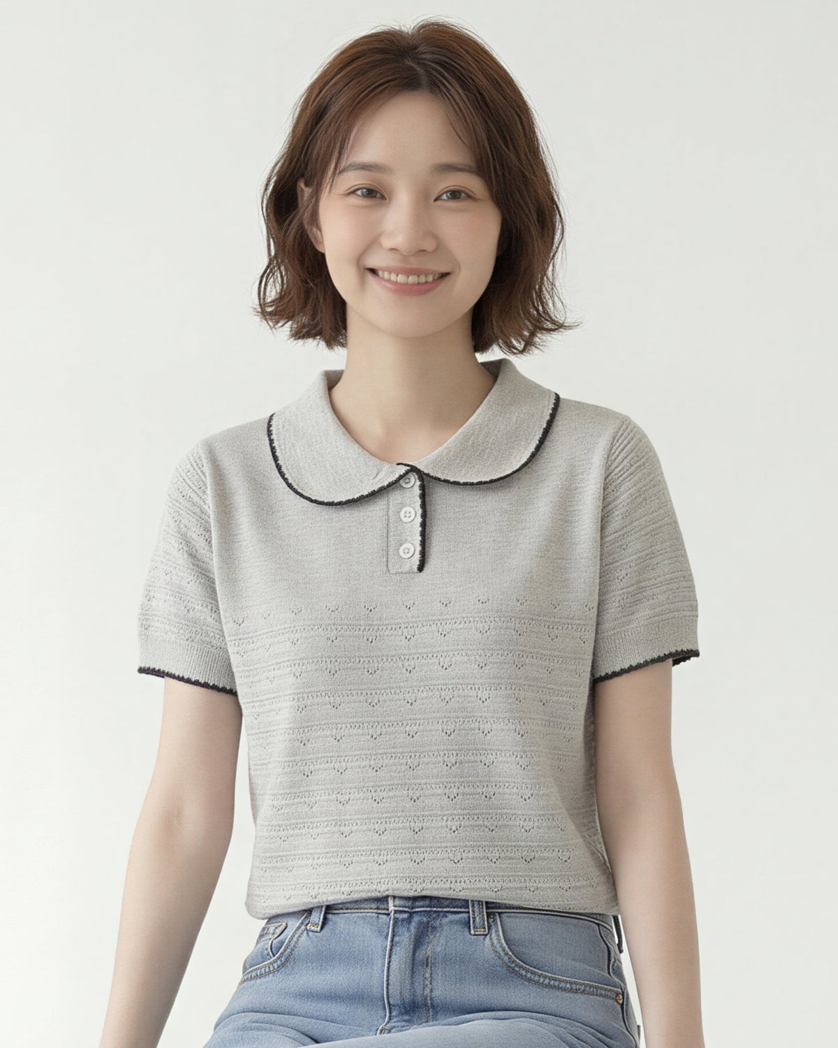配色パイピングのポロ襟 透かし編み柄 ほどよくシェイプするニットTシャツ