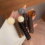 【全4色】アセテート風ビーズ付き ツイストデザイン 電話コードヘアゴム