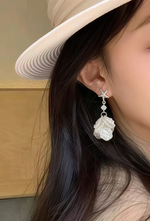 流れるような輝きと軽やかな表情 フェイスラインを美しく見せる ヒトデ＆シェルペンダントピアス
