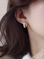 シェル切り替えダブルサークルピアス