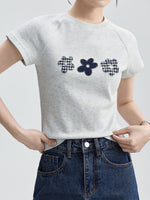 スリムフィット ラグランスリーブ フラワーアップリケTシャツ