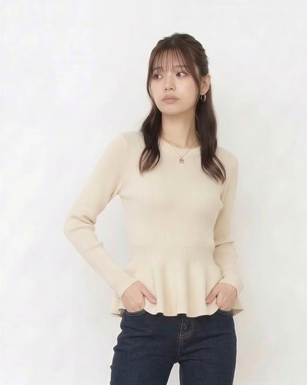 ウエストシェイプ フリルヘム ニットトップス