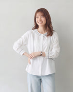 配色ステッチのクルーネックシャツ